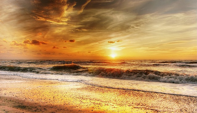 海滩 波浪 日落 - 上的免费照片