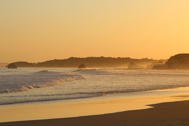 海滩 日落 葡萄牙 - 上的免费照片