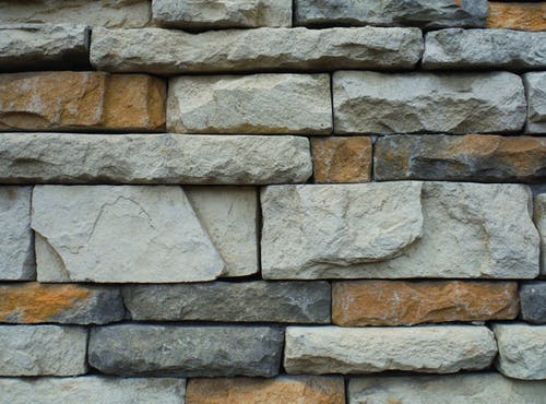 灰色和棕色的混凝土砖墙 · 免费素材图片