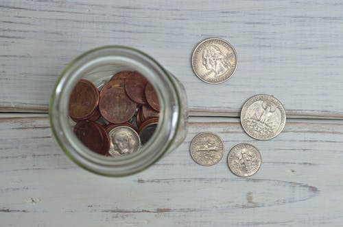 罐子里的硬币 · 免费素材图片