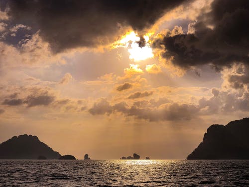 太阳在海上与群岛 · 免费素材图片