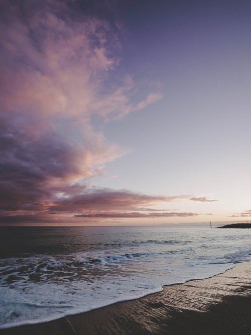 日落时采取的海水 · 免费素材图片