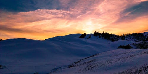 日落期间白雪皑皑的沙漠 · 免费素材图片