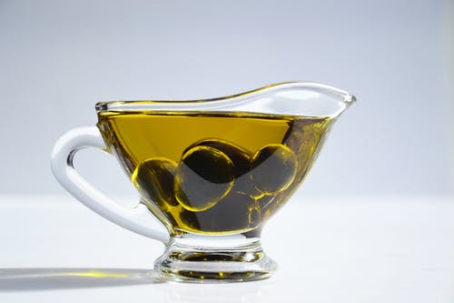 橄榄油杯橄榄油的照片 · 免费素材图片