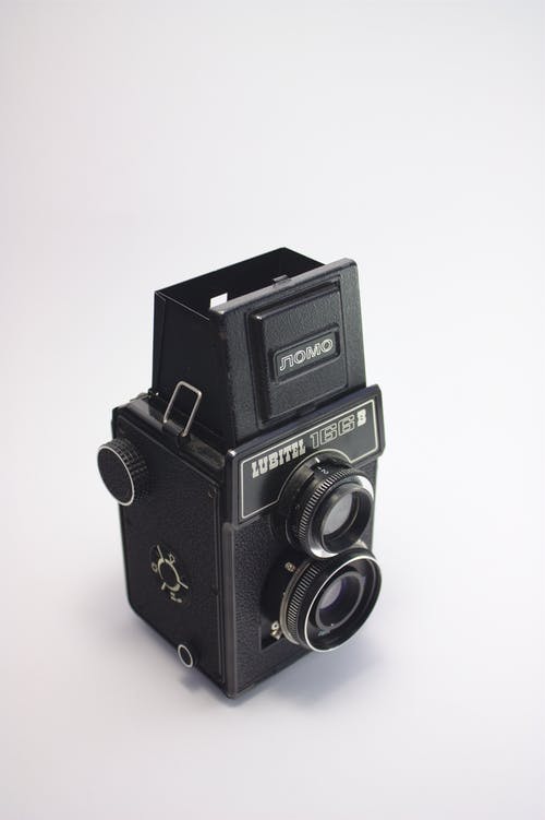 黑色双镜头相机 · 免费素材图片