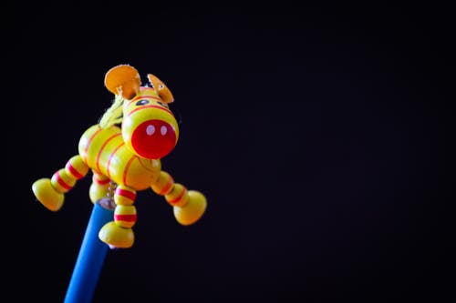 黄色驴杆玩具 · 免费素材图片