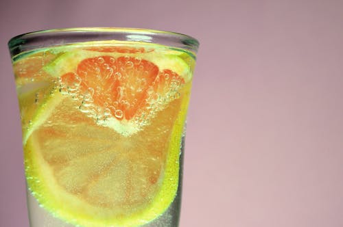 柑橘饮料的选择性摄影 · 免费素材图片