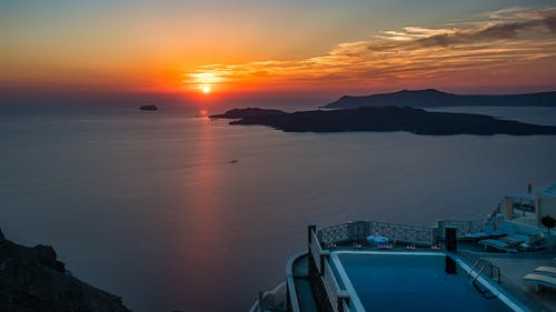 日落期间海洋风景 · 免费素材图片