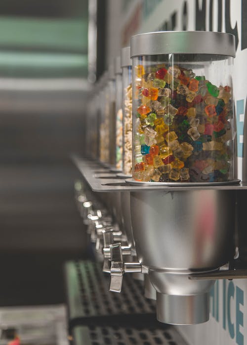 糖果点胶机的选择性聚焦摄影 · 免费素材图片
