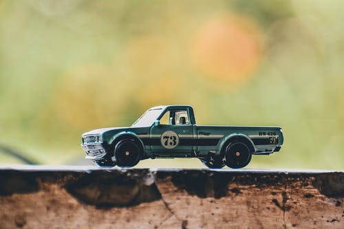 玩具卡车的选择性聚焦摄影 · 免费素材图片