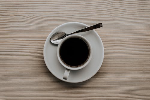 平躺照片杯咖啡 · 免费素材图片
