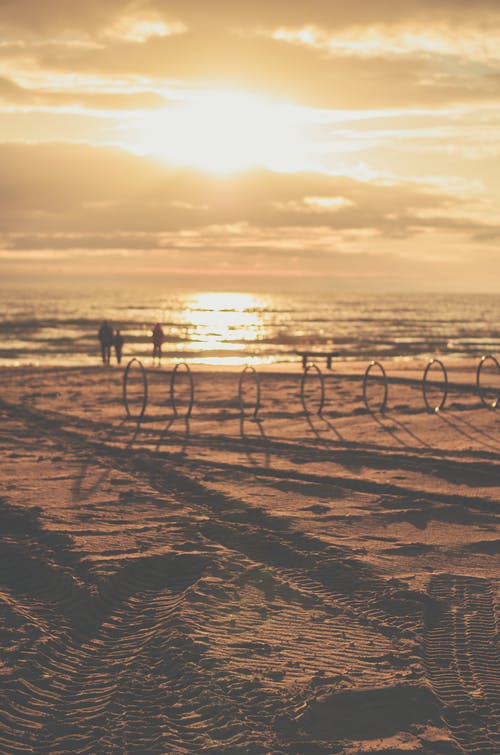 日落期间海滨的照片 · 免费素材图片