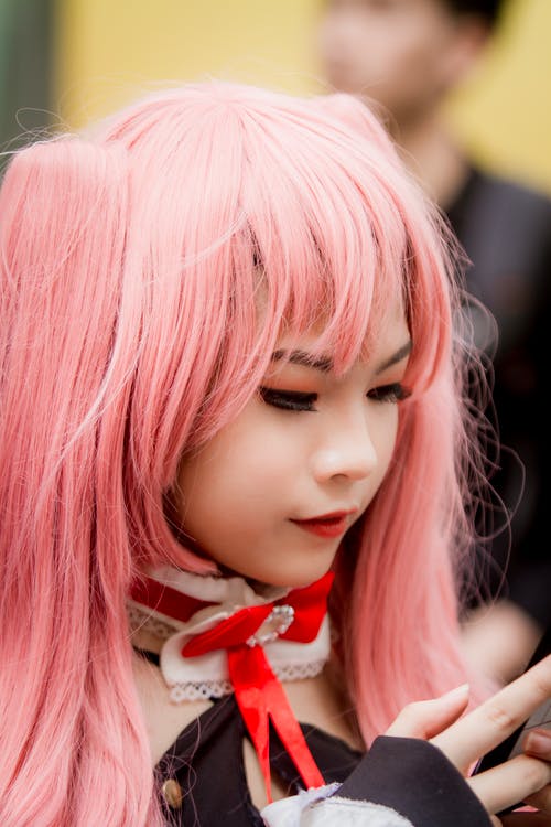 粉红色头发的女孩的照片 · 免费素材图片