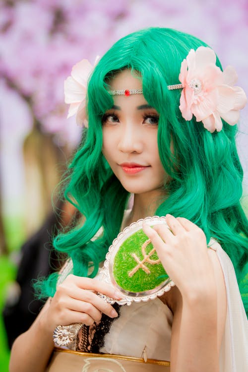 绿色的头发的女人的特写照片 · 免费素材图片