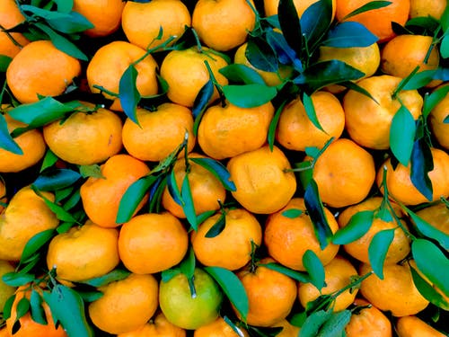 堆橙色水果 · 免费素材图片