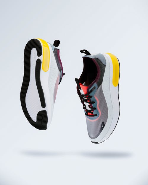 运动鞋在白色背景上的照片 · 免费素材图片