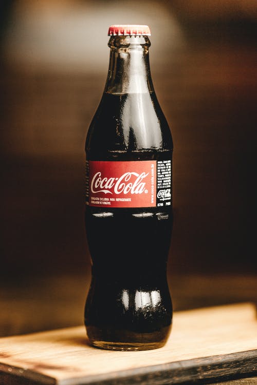 可口可乐玻璃瓶微距摄影 · 免费素材图片