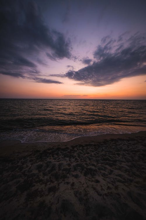 黎明时海滩的照片 · 免费素材图片