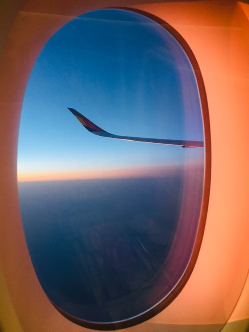 天空的飞机窗口视图 · 免费素材图片