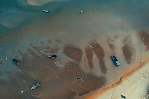空中射击的水工艺品靠近海边 · 免费素材图片
