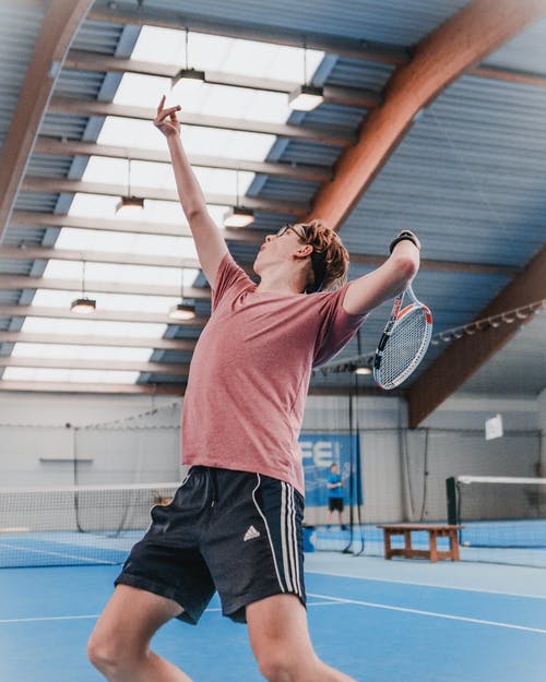男子打网球的照片 · 免费素材图片