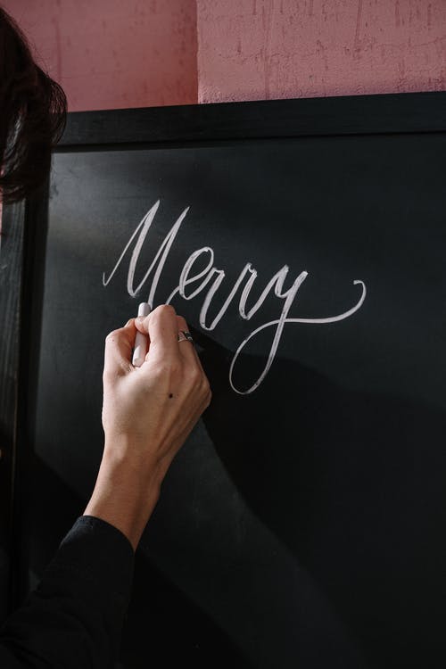 人手上黑色的木制框架 · 免费素材图片