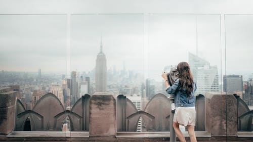 有关skyscapers, 城市, 女人的免费素材图片