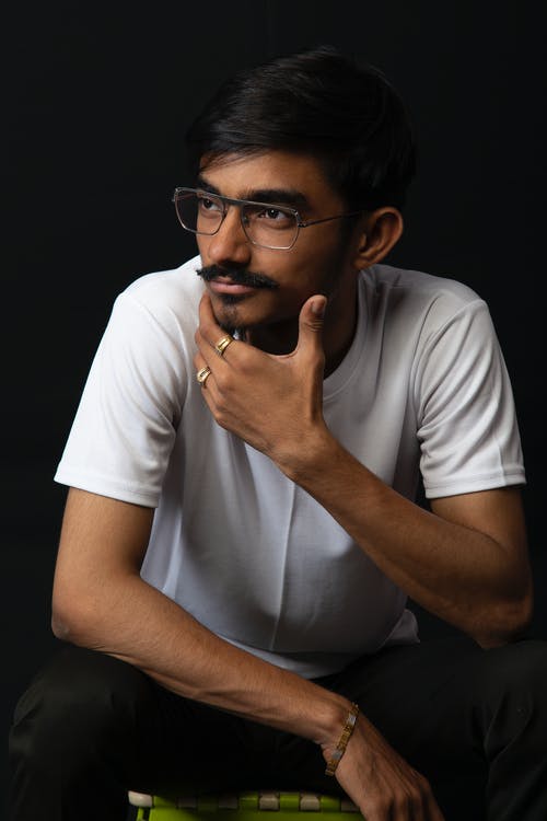 有关人, 坐, 垂直拍摄的免费素材图片