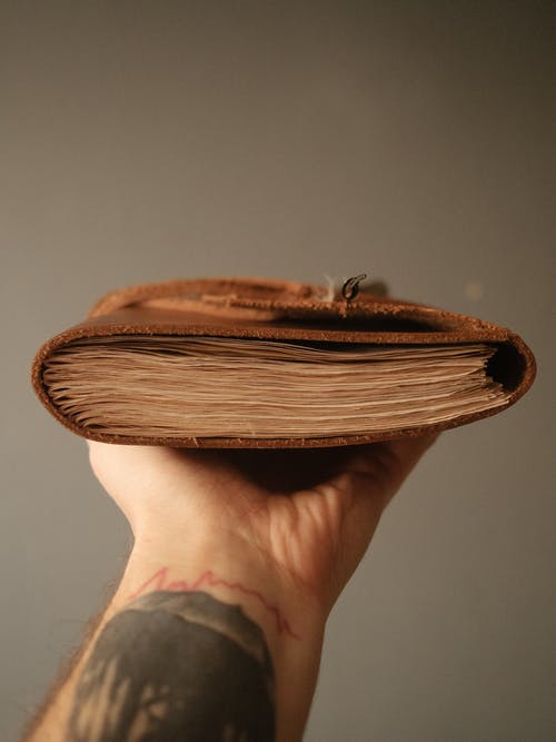 有关刺青的, 垂直拍摄, 握住的免费素材图片