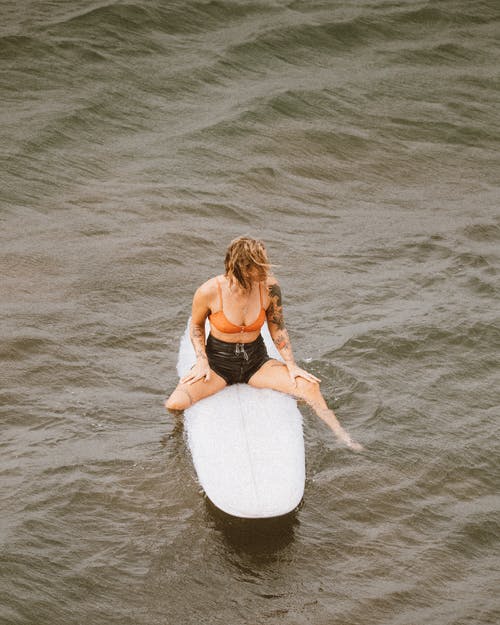 有关垂直拍摄, 女人, 水上运动的免费素材图片