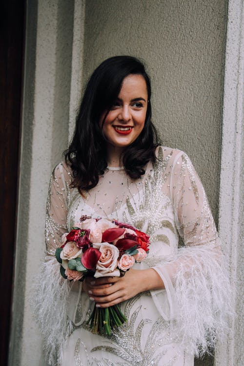 有关一束鲜花, 人, 垂直拍摄的免费素材图片