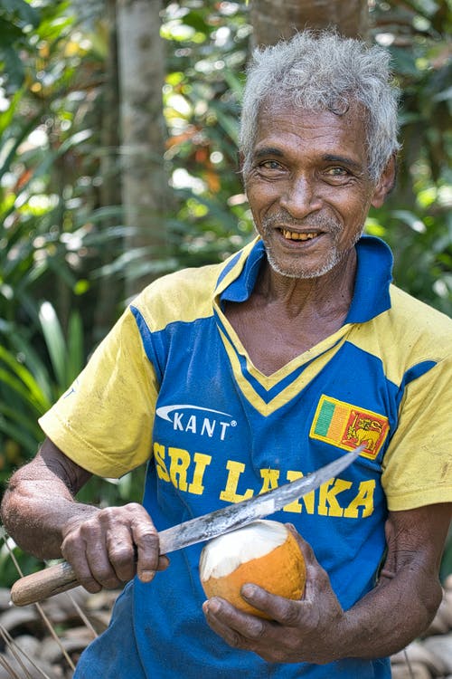 有关人, 刀, 垂直拍摄的免费素材图片