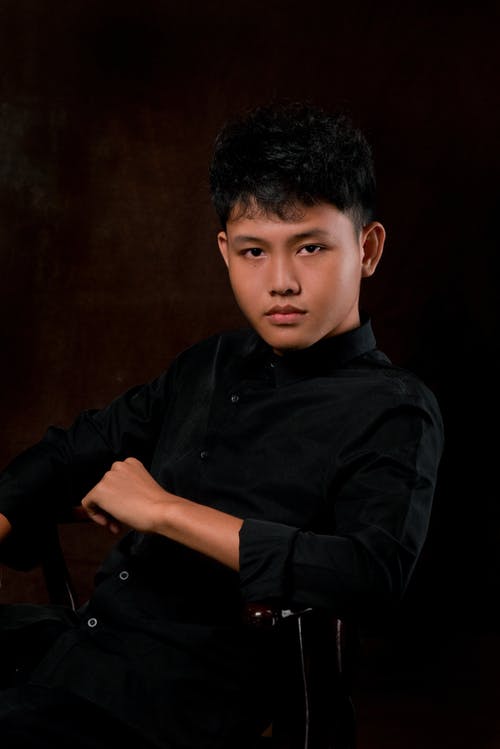 有关人, 垂直拍摄, 摆姿势的免费素材图片