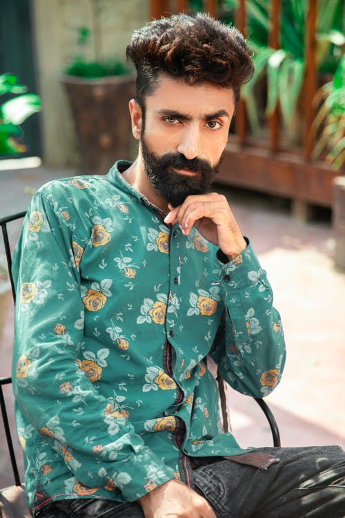 有关人, 坐, 垂直拍摄的免费素材图片