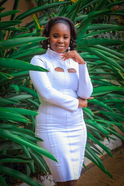 有关垂直拍摄, 女人, 摆姿势的免费素材图片