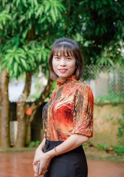 有关垂直拍摄, 女人, 微笑的免费素材图片