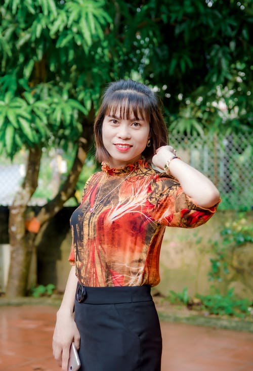 有关垂直拍摄, 女人, 微笑的免费素材图片