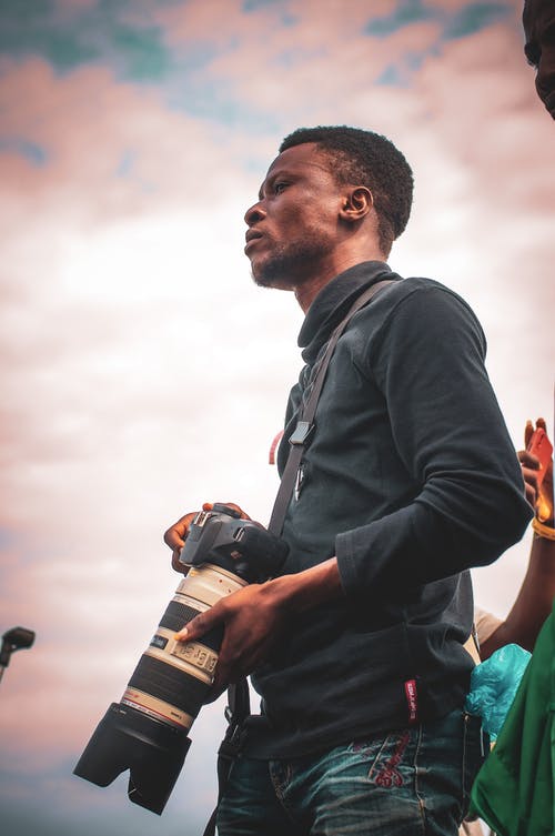 有关单反相机, 垂直拍摄, 户外的免费素材图片