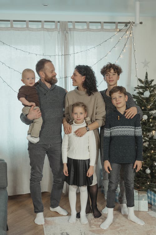 有关圣诞气氛, 垂直拍摄, 家人的免费素材图片