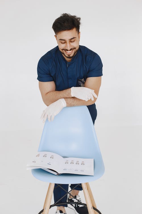 有关人, 医用手套, 垂直拍摄的免费素材图片