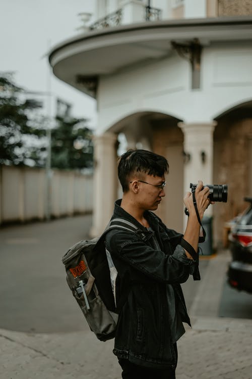 有关人, 单反相机, 垂直拍摄的免费素材图片