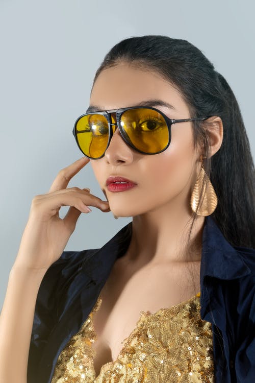 有关垂直拍摄, 女人, 工作室拍摄的免费素材图片