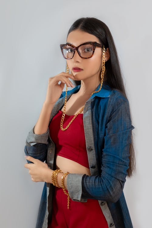 有关垂直拍摄, 女人, 工作室拍摄的免费素材图片