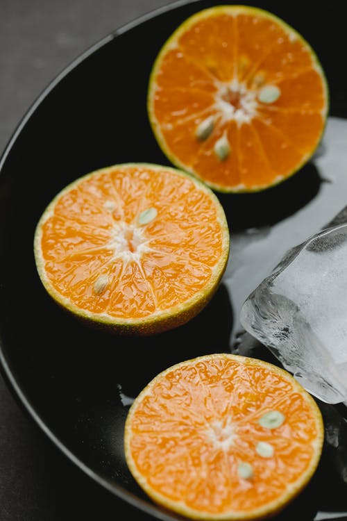 在碗里的柑橘橙片加冰 · 免费素材图片