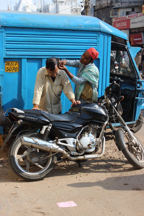 有关垂直拍摄, 摩托车, 新德里的免费素材图片