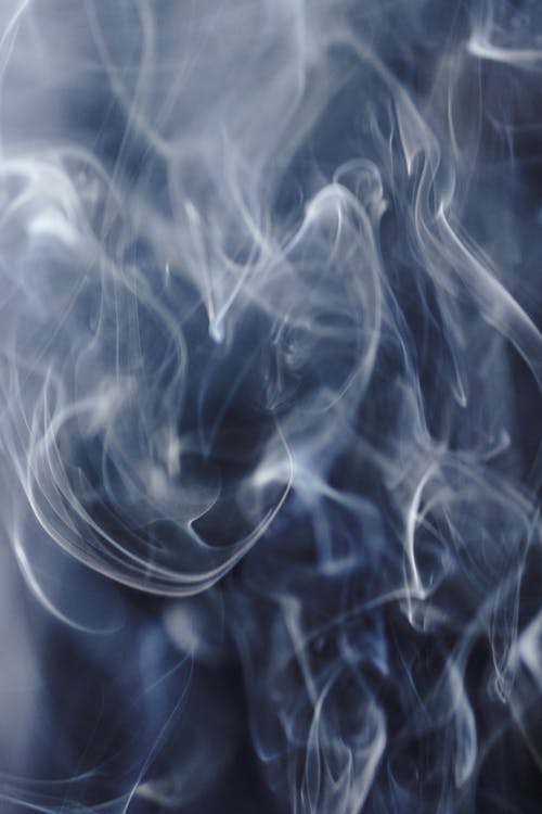 动态烟雾在空气中产生波的抽象背景 · 免费素材图片