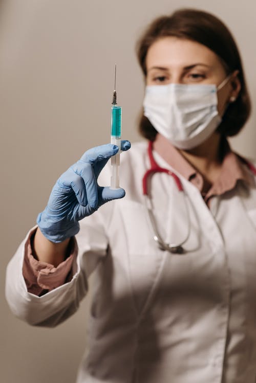 有关医护人员, 垂直拍摄, 手套的免费素材图片