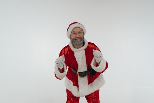 有关圣诞老人服装, 工作室拍摄, 微笑的免费素材图片