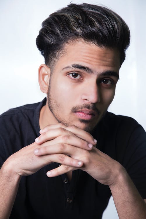 有关人, 垂直拍摄, 工作室拍摄的免费素材图片