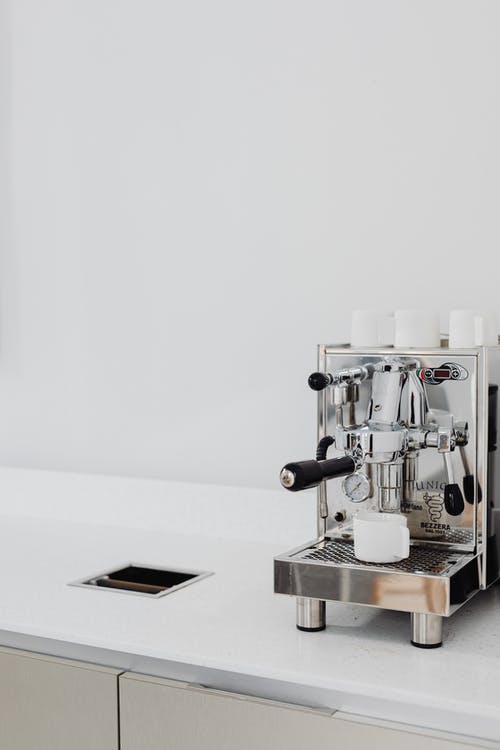 有关咖啡机, 垂直拍摄, 浓缩咖啡机的免费素材图片